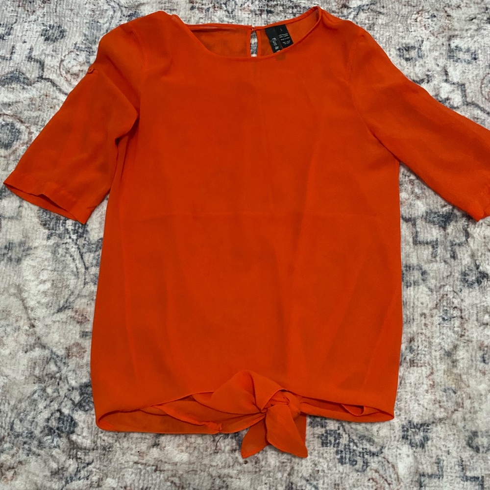 Orange sheer top